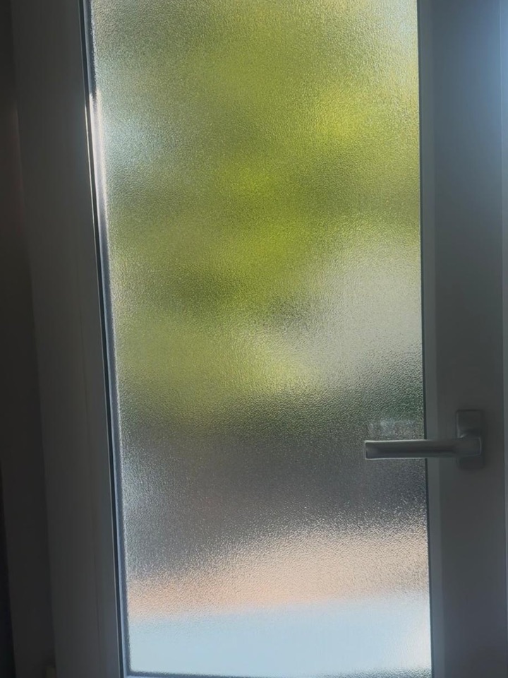 Glastür nach der Reinigung